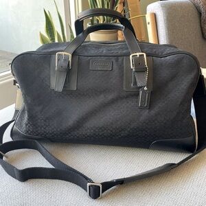Classy black Coach weekend bag